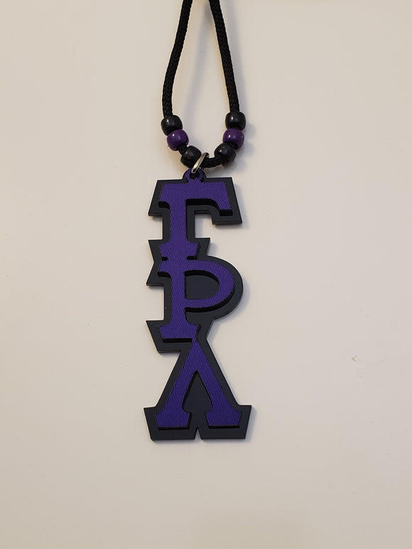 Gamma Rho Lambda - Purple Twill Letters on Black Acrylic Tiki Necklace