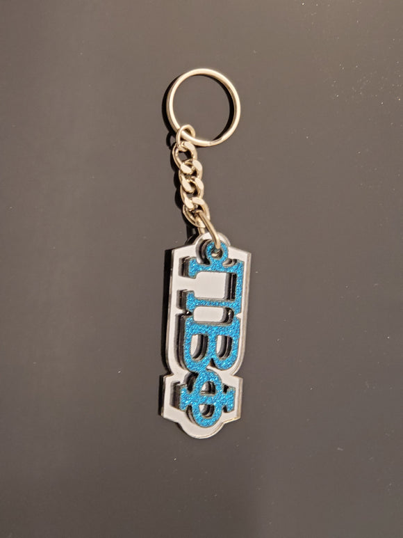 Pi Beta Phi - Acrylic Keychain with Glitter Letters and Mirror Background