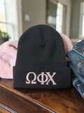 Omega Phi Chi Embroidered Beanie: Pink Letters in Black - CP90 - 29549-78DD62-062226