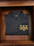 Pi Lambda Chi Ladies Black Polo Shirt: Embroidered in Metallic Gold with Letters and Latina Sorority Inc., Dry Zone® Sport-Tek® L475-POLO