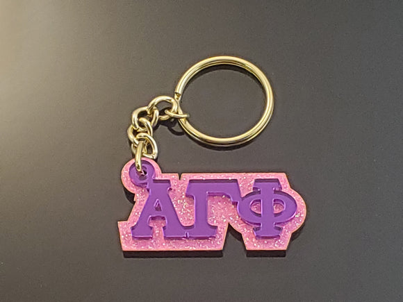 Alpha Gamma Phi - Keychain, 03-Acrylic - Purple Mirror Letters on Pink Glitter-AGF-03-KEY-PRPLMIR-PNKGLTR