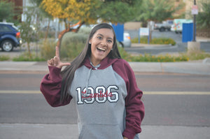 Lambda Theta Nu - ST267  Sport-Tek® Raglan Colorblock Pullover Hooded Sweatshirt with 1986